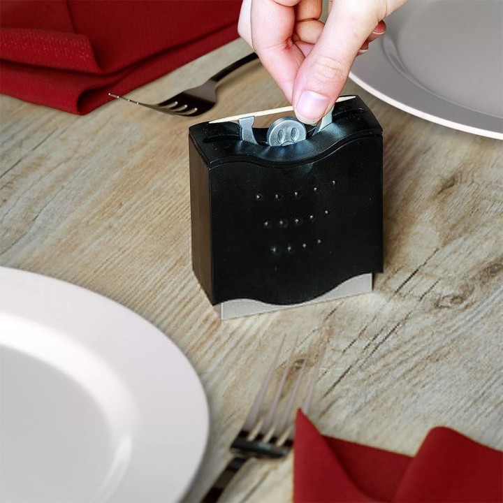 DISTRIBUTEUR DE CURE DENTS