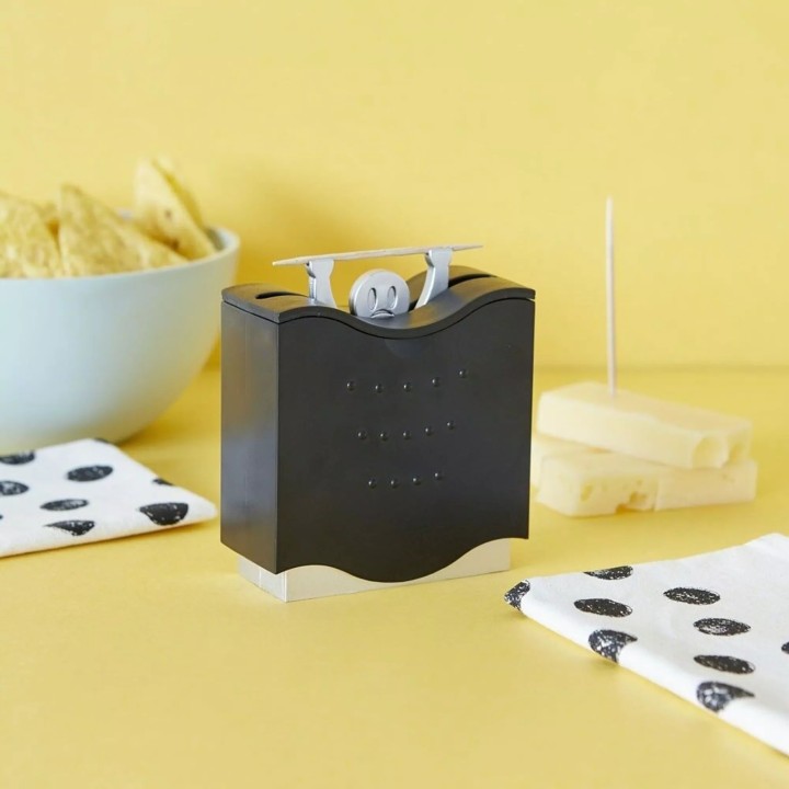 DISTRIBUTEUR DE CURE DENTS